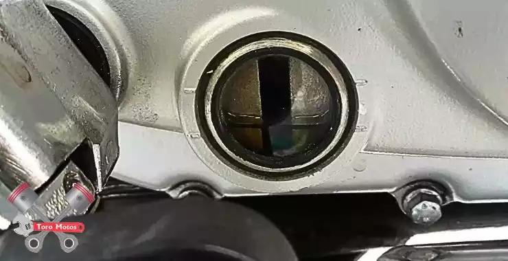 cuanto aceite se le echa a una boxer ct 100
